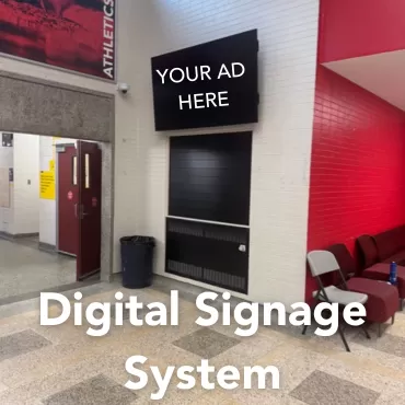 It shows an entrance with a big black sign on top of the entrance saying "Post your ad here" sign.